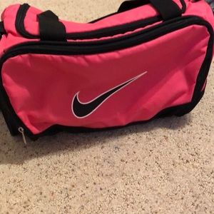 Small pink nike duffel bag